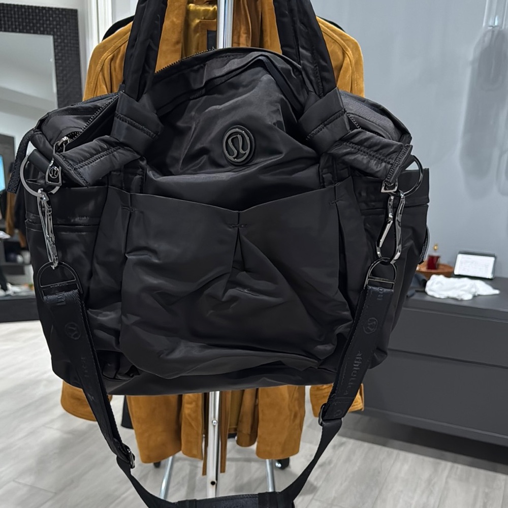 Lululemon Athletica Black Duffel Bag with Structured Design